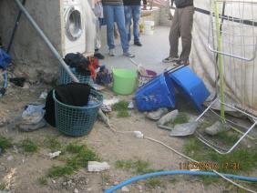 A new washing machine in an alcove outside
